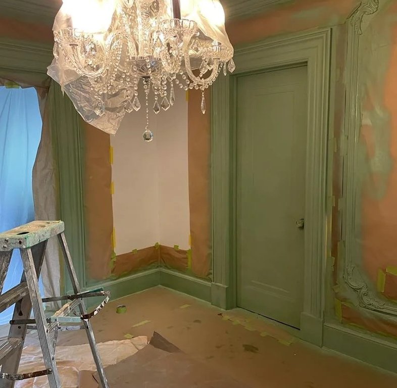 Green painted ornate ceiling medallion detail
